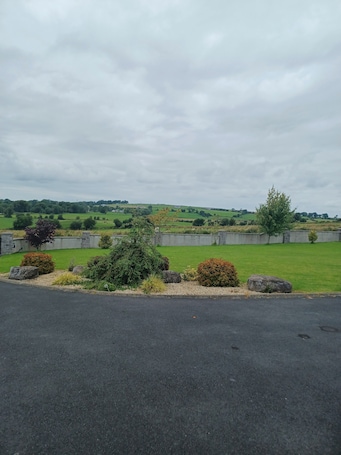 Property grounds. Deluxe double bedroom in a picturesque location just 25 minutes from Galway City