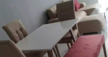 The apartment has a balcony overlooking the city.