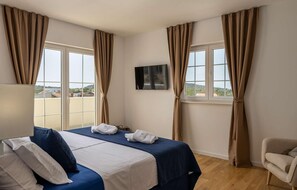 3 Schlafzimmer, Reisekinderbett, kostenloses WLAN, Bettwäsche