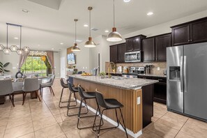 Fridge, microwave, oven, stovetop - Enchanted Estate: 7BR, Private Pool, Game Room, Disney 15 Min! (Kissimmee)