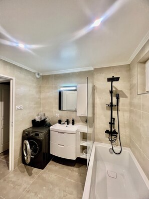 Hair dryer, towels, soap, shampoo