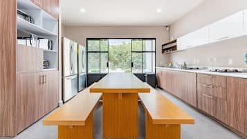 Fridge, microwave, stovetop, coffee/tea maker