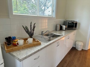Een magnetron, een oven, een kookplaat