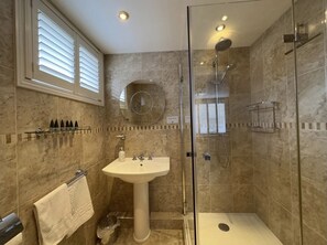 Hair dryer, towels, soap, shampoo