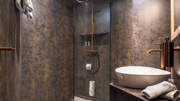 Luxury Apartment | Bathroom | Shower, rainfall showerhead, hair dryer, heated floors