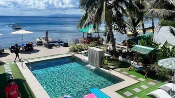 Outdoor pool, open 8:00 AM to 10:00 PM, pool umbrellas, pool loungers
