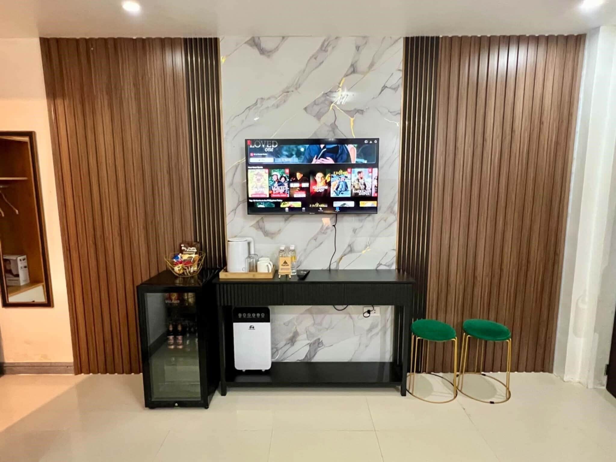 Superior Room | Living area | 50-inch Smart TV with digital channels, Netflix, ping pong