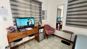 エコノミー シングル ルーム | 高級寝具、セーフティボックス (室内)、遮光カーテン、防音設備