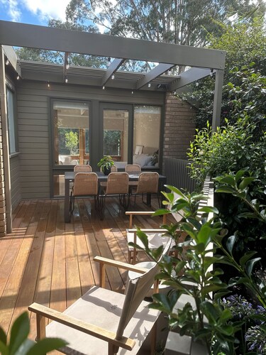 Designer home surrounded by beautiful garden- secure parking, remote check in