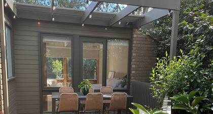 Designer home surrounded by beautiful garden- secure parking, remote check in