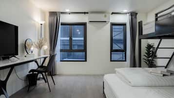 Ropa de cama de alta calidad, colchones con pillow-top y escritorio