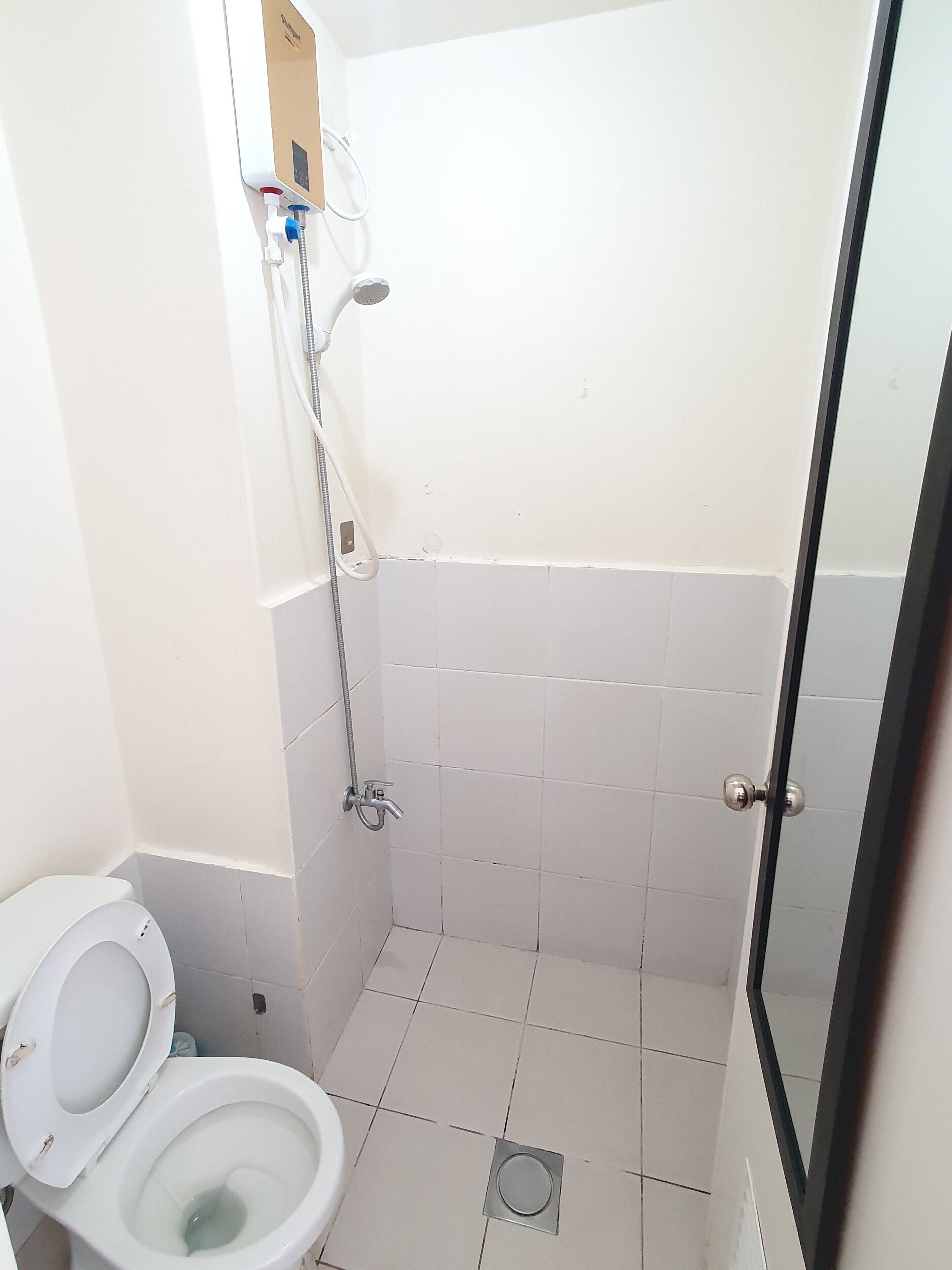 Badekåper, tøfler, håndklær og såpe