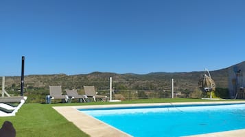 Outdoor pool, pool umbrellas, pool loungers