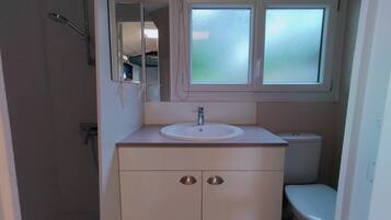 Chuveiro, papel higiĂȘnico