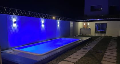 House just a few meters from Praia do Bosque with a beautiful pool and barbecue area