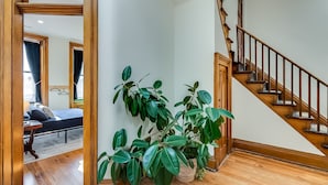 A staircase with wooden railings and a wooden floor. - The Selbert - In the Heart of The Bourbon Trail! (Frankfort)