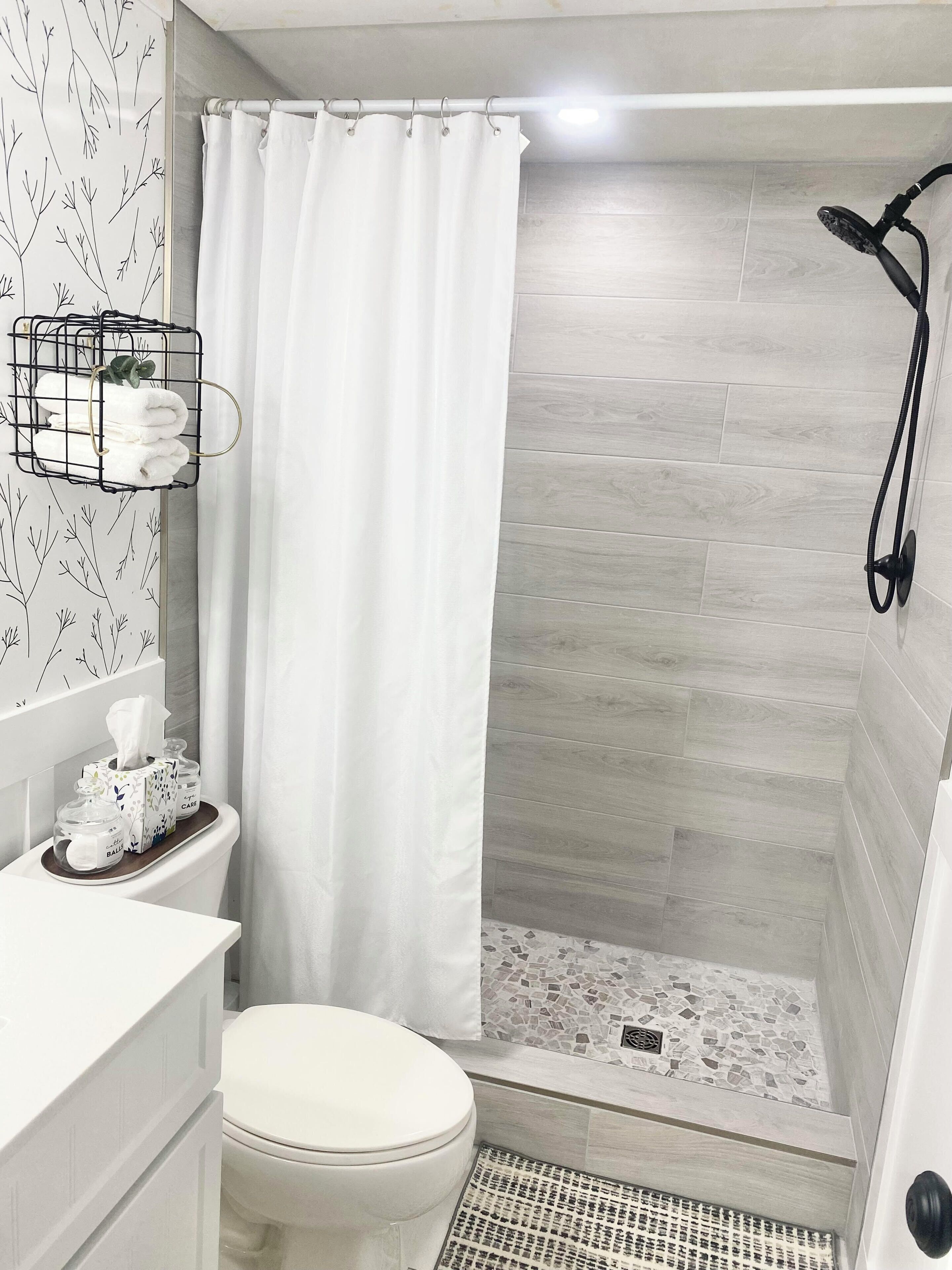 Shower, hair dryer, towels, toilet paper