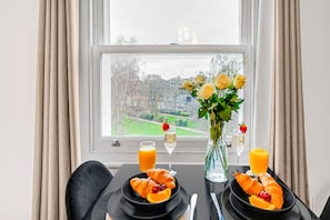 Enjoy a leisurely breakfast with a view of the surrounding neighborhood from the comfort of your room.