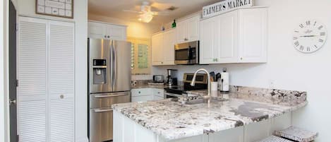 Coffee/tea maker, fridge, microwave, oven