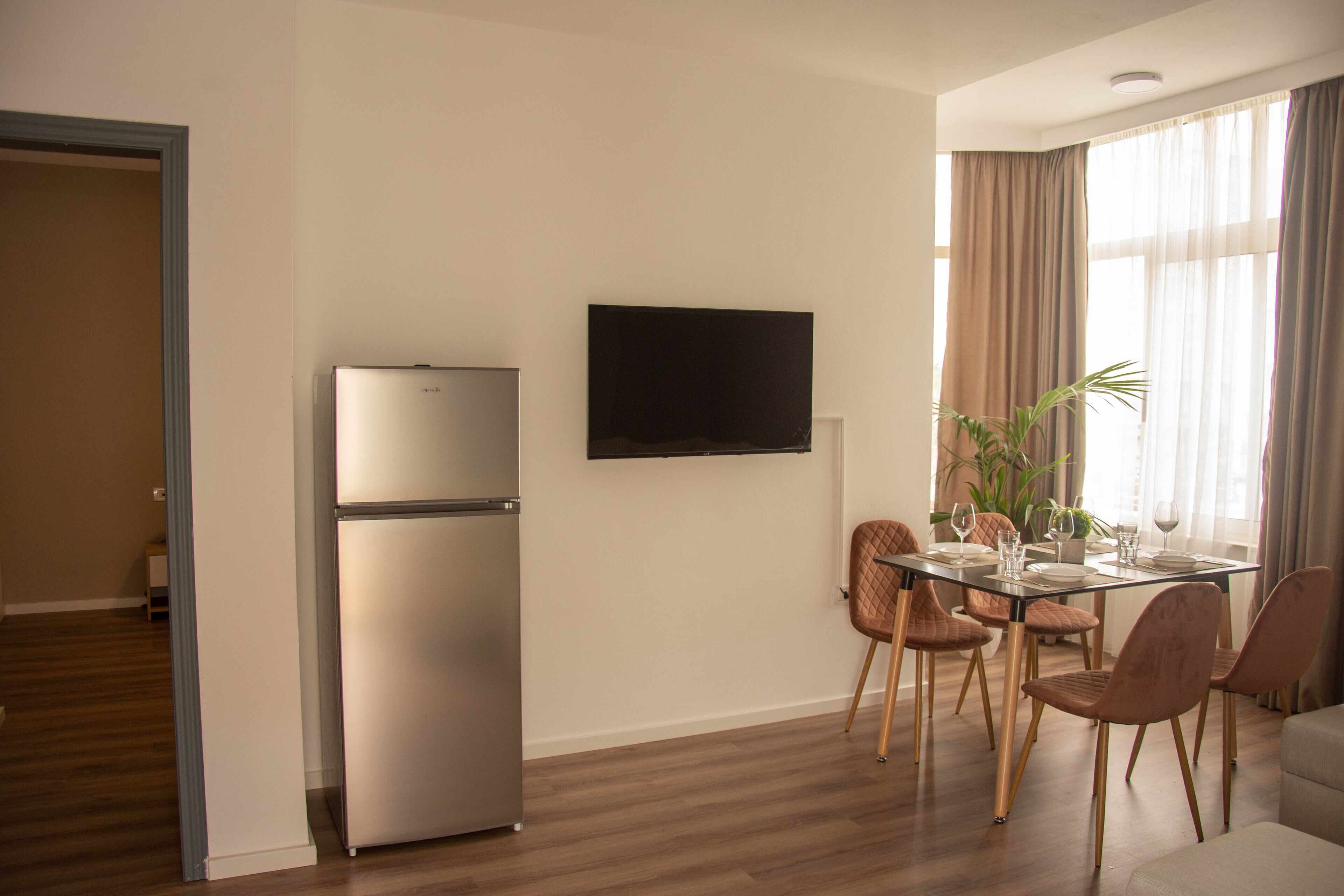 Family Apartment | Living area | 43-inch Smart TV with digital channels