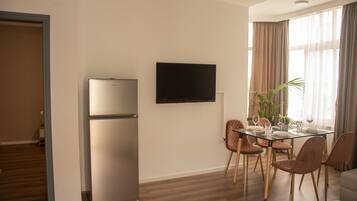 Family Apartment | Living area | 43-inch Smart TV with digital channels