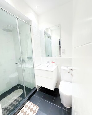 Shower, hydromassage showerhead, towels, soap