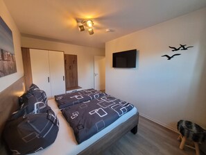 2 chambres, coffre-fort, lit de bébé portatif, accès au Wi-Fi (inclus)