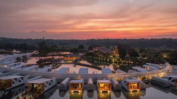 Waterfront villas surround a central courtyard, offering panoramic views of the surrounding landscape.
