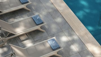 Seasonal outdoor pool, pool umbrellas, pool loungers