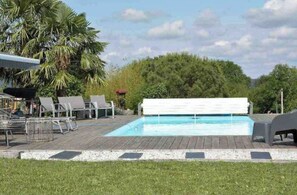 Alberca al aire libre y alberca climatizada