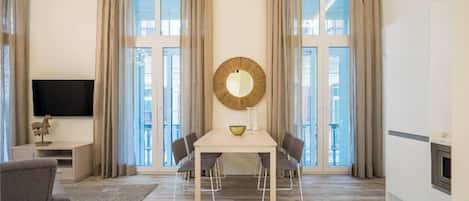 Premium Room | Living area | Flat-screen TV