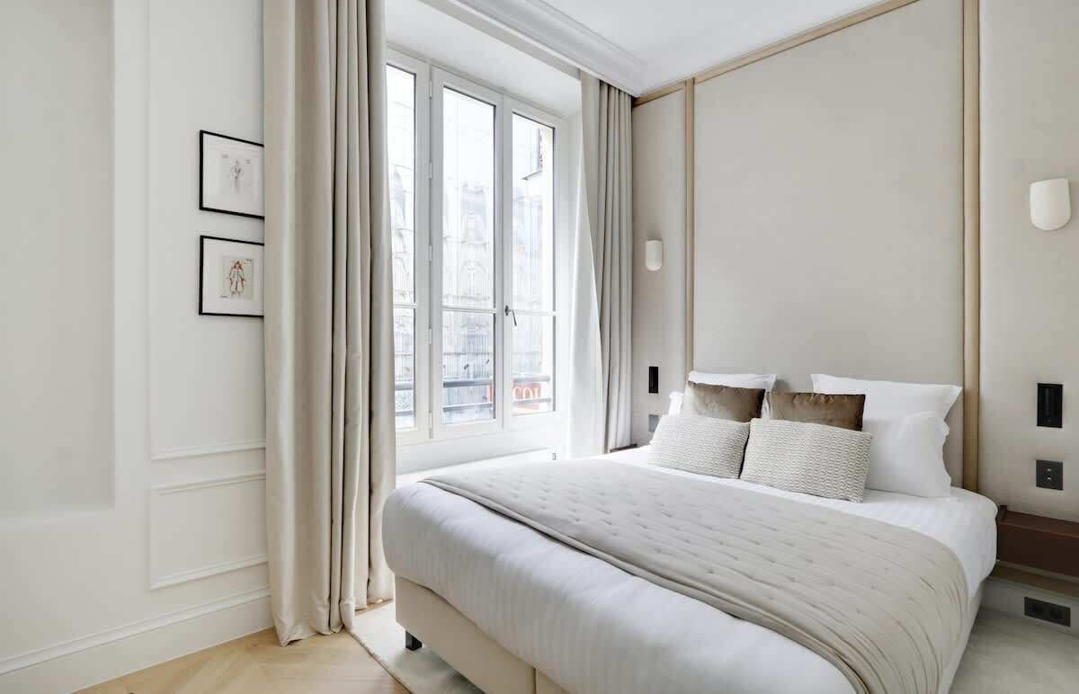 2 dormitorios, tabla de planchar con plancha, cuna de viaje y wifi