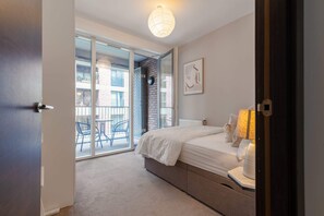 Eenvoudig appartement, Meerdere bedden | 3 slaapkamers, een laptopwerkplek, een strijkplank/strijkijzer