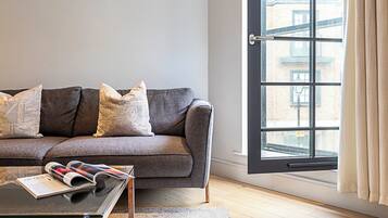 Basic Apartment, 1 Double Bed | Living area | TV