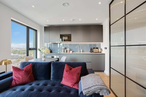 Basic Apartment, 1 Double Bed | Living area | TV - Sleek and Stylish Studio Apartment (London)