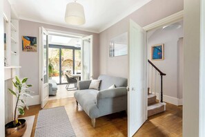 Basic House, Multiple Beds | Living area | TV