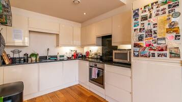 Apartment | Private kitchen | Dining tables