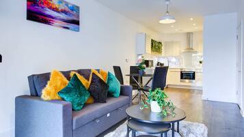 Basic Apartment, 1 Double Bed | Living area | TV