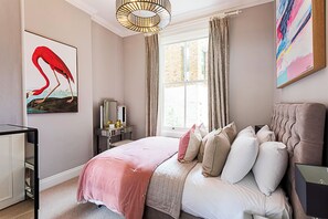 1 bedroom, desk, laptop workspace, bed sheets