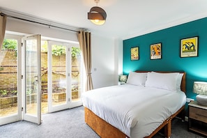 2 bedrooms, desk, laptop workspace, iron/ironing board