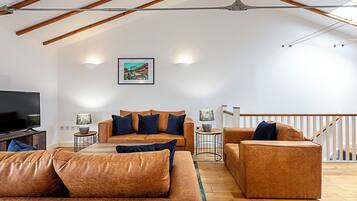 Basic House, 2 Double Beds | Living area | TV