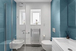 Basic House, Multiple Beds | Bathroom | Shower, hair dryer, towels, soap