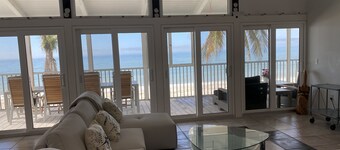 Seas The Day at this Bonita Beach Cottage directly on the beach 2 story views !