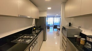 Private kitchen - Super-luxury apartment with an ocean view, across from the João Pessoa sign (João Pessoa)
