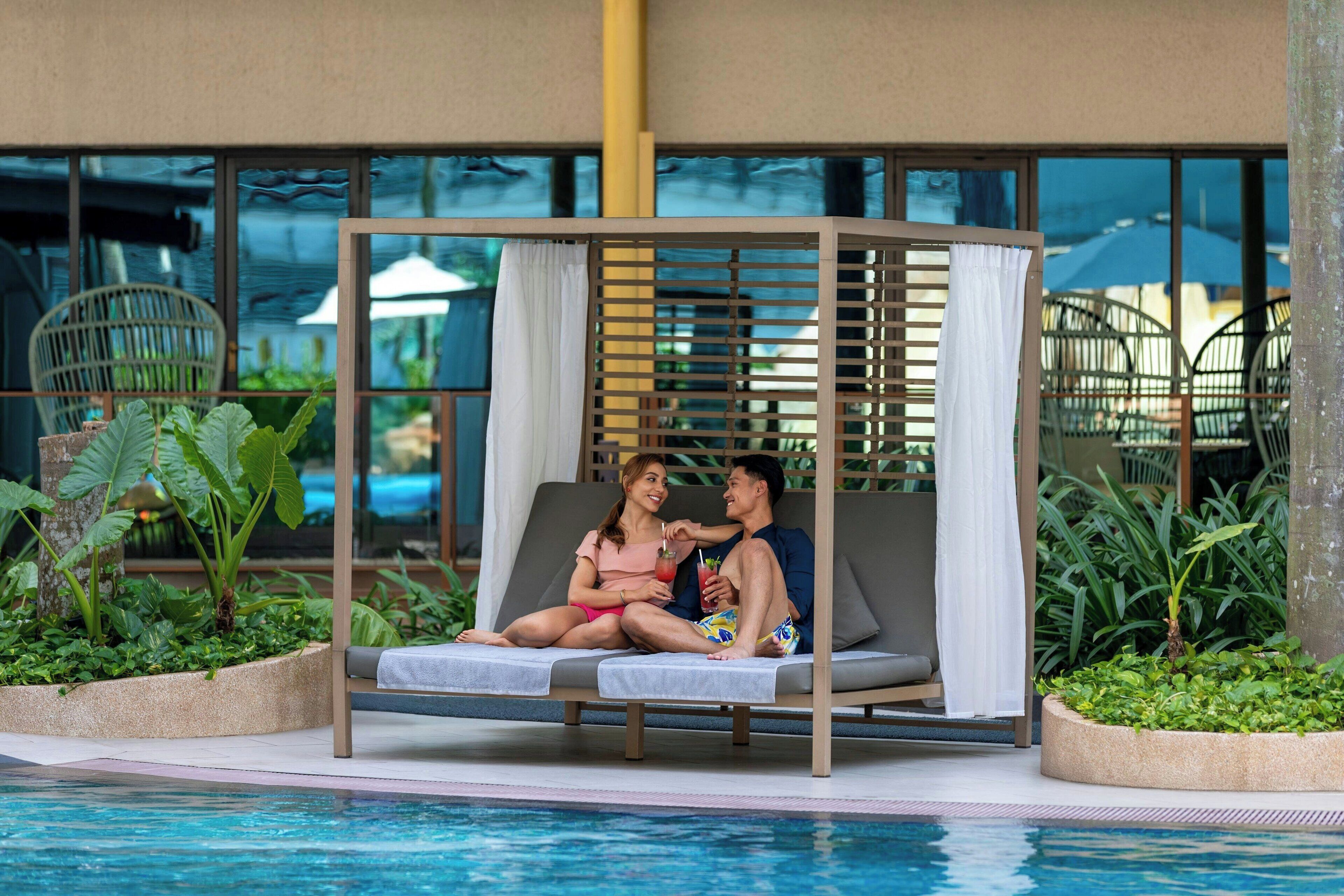 Outdoor pool, open 7:00 AM to 7:00 PM, pool umbrellas, sun loungers