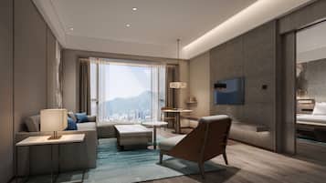 Suite Deluxe, 1 habitación, vistas a la ciudad | Sistema de insonorización y tabla de planchar con plancha