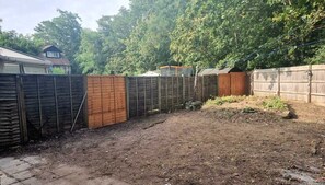 Enjoy an outdoor space with a fenced yard, perfect for relaxation and taking in the surroundings.