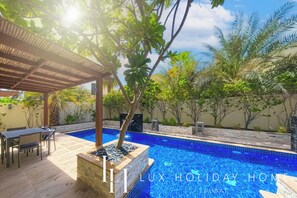 Outdoor pool - LUX The Meadows 5 Bed Villa (Dubai)
