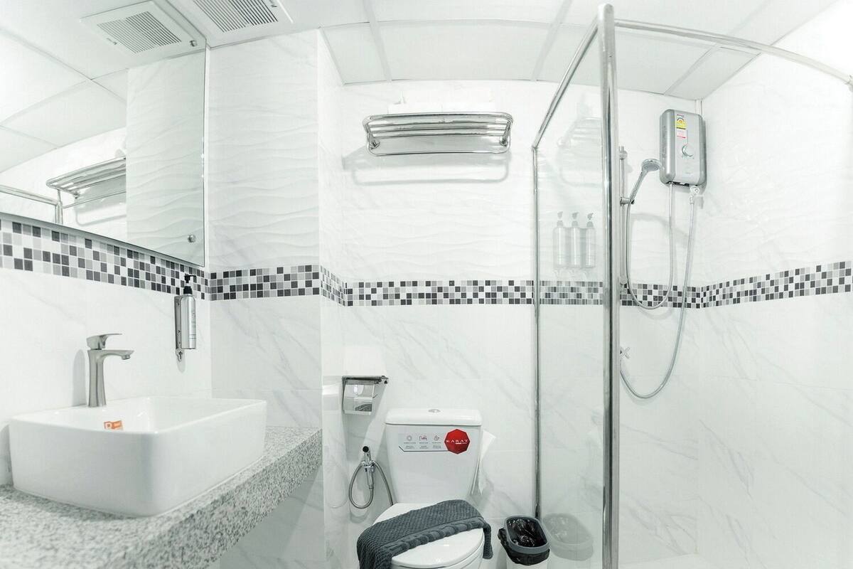 Hair dryer, slippers, towels