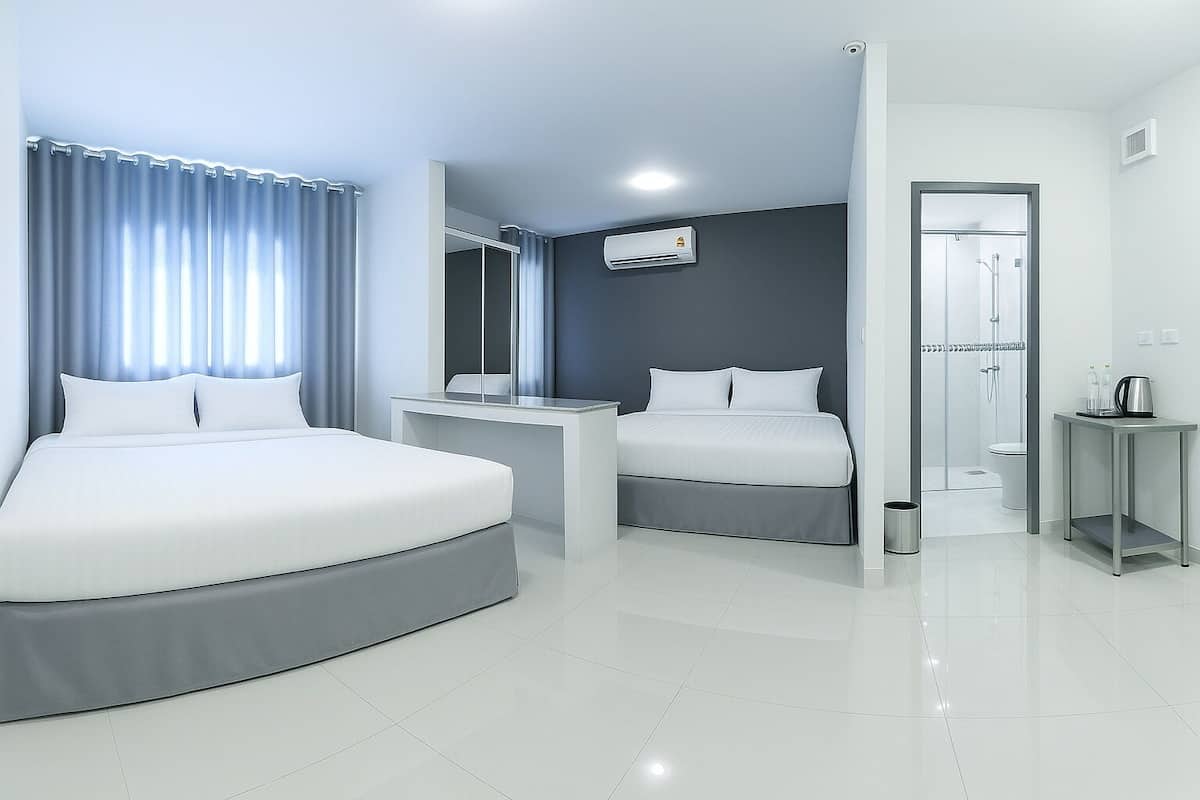 Family Room, Balcony | 1 bedroom, blackout drapes, soundproofing, free WiFi